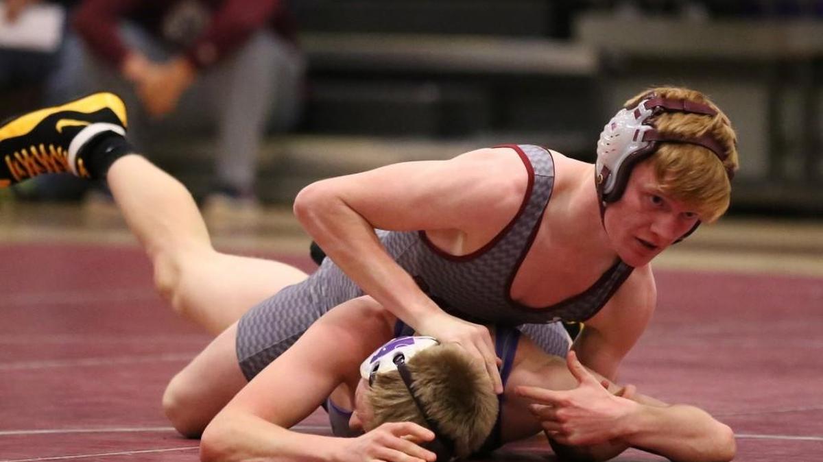 Lee’s Summit North sophomore Triston Jones (top), a qualifier at 132 pounds last season, is one of four wrestlers with state-tournament experience on this year’s squad.