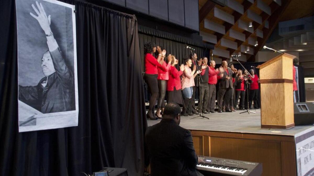The “One Voice for Freedom” mass choir was flanked by posters of Rev. Dr. Martin Luther King Jr. last year on the national holiday recognizing the civil rights leader.