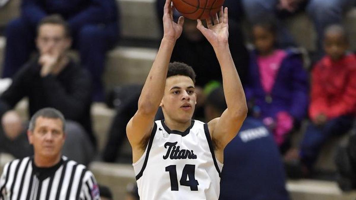 Lee’s Summit West’s Christian Bishop took a shot against Raytown on Dec. 29 during the William Jewell Holiday Classic. Bishop averaged 16 points and was selected Most Valuable Player for helping the Titans win the Cardinal Division.