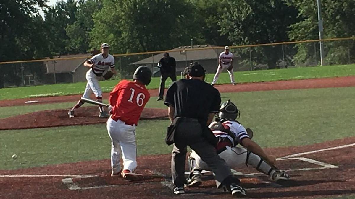 Outlaws pitcher Justin Root throws to Robert Roggemann of Elsberry Post 226 during Wednesday’s game in the Wood Bat Invitational.