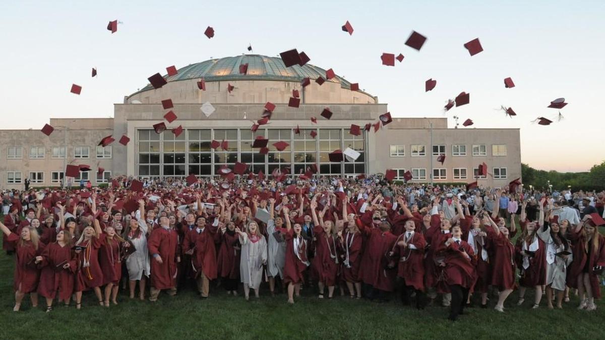 This graduating class — and their families — from Lee’s Summit North High School had the use of cell phones to text, take pictures and video, unlike those in the dark ages 25 years ago.