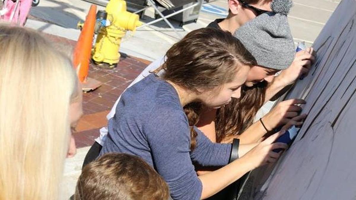 Lee’s Summit students will be competing in a live mural project this weekend called “Stuck on Art,” where students will create murals from black masking tape.