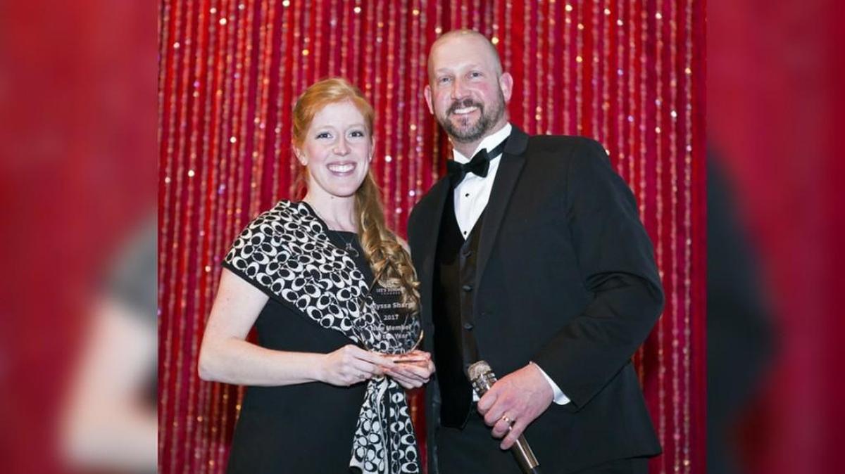 Alyssa Sharp (left), a certified public accountant with Mize Houser & Co., was honored Saturday, Jan. 27, 2018, as the 2017 Steve Gouldsmith New Member of the Year during the Lee’s Summit Chamber of Commerce’s annual Gala Royale. She received the award from 2017 Chair of the Board Tyler Morehead with Morehead Agency LLC.
