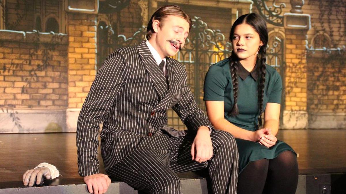 In Lee’s Summit North High School’s production of the musical comedy, “The Addams Family,” Gomez Addams, played by Lukas Parrish, and his daughter, Wednesday Addams, played by Katie Shatzer, have a heart-to-heart talk. The show will run Nov. 16 and 17 at Lee’s Summit North.