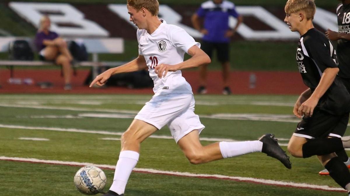 Lee’s Summit North defender Kale Soukup moves the ball downfield during the Broncos’ match against Park Hill South Wednesday at Bronco Stadium. North overcame the fatigue from playing its third match in as many days to win 1-0 in overtime.