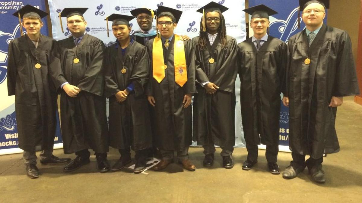 Several area students earned their high school diplomas and college associate’s degrees at the same time by taking courses through the Missouri Innovation Campus at Summit Technology Academy. Pictured (from left) are Spencer Werremeyer, Lee’s Summit North High School, software development major, employed at NIC; Cody DeMent, Lee’s Summit West High School, software development major, employed at NIC; Shane Tenorio, Raytown South High School, software development major, employed at Cerner Corp.; Kirk Nooks, president of Metropolitan Community College-Longview; Natan Garcia, Raytown South High School, software development major, employed at DST Systems; Thilon Berry, Center High School, software development major, employed at AWNIX; Jack Bliss, Blue Springs South High School, systems engineering major, employed at Alexander Open Systems; and Matthew Feith, Raymore-Peculiar High School, systems engineering major, employed at VML.