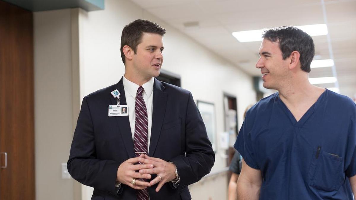 New Lee’s Summit Medical Center CEO John McDonald intends to work closely with physicians to ensure the center provides the equipment and support needed for the highest levels of patient care. McDonald, left, and Timothy Roberts, orthopedic surgeon and medical director of the Center’s total joint program, recently discussed care for orthopedic patients.