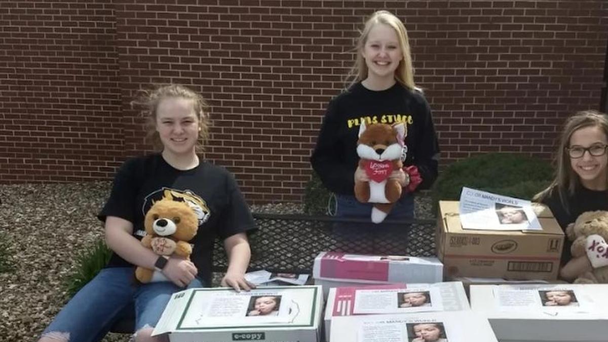 Delivering art supplies to Children’s Mercy Hospital were, from left, Kinley Monk, Kate Higgins and Libby Kump from Pleasant Lea Middle School.
