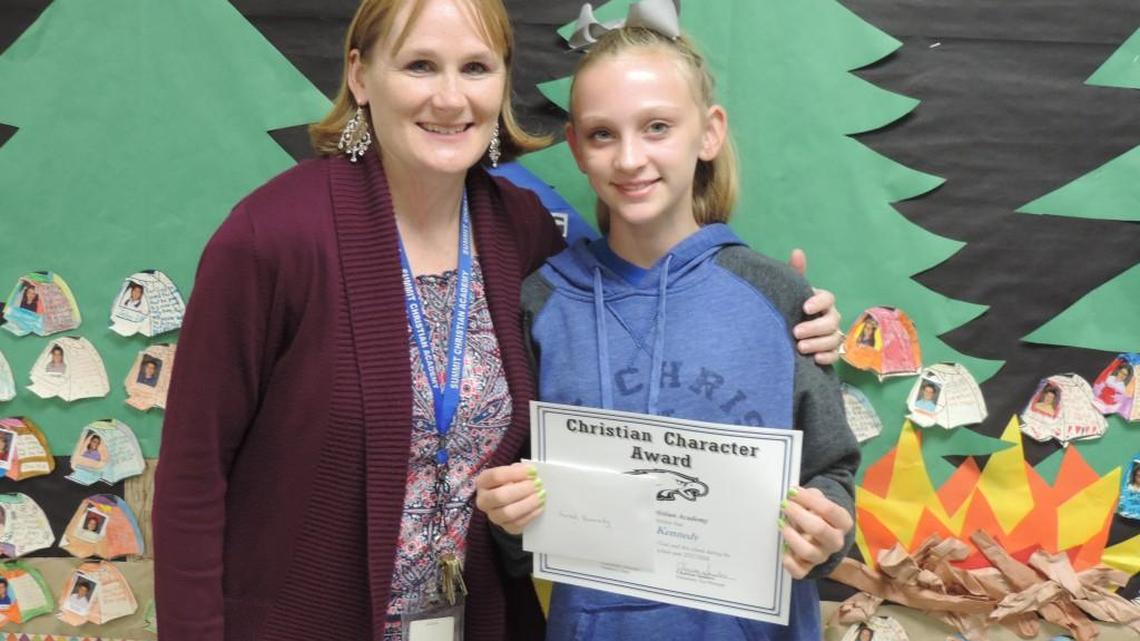 Summit Christian Academy Elementary Vice Principal Charissa Sanders presented sixth-grader Sarah Kennedy with the Christian Character Award for the first quarter.