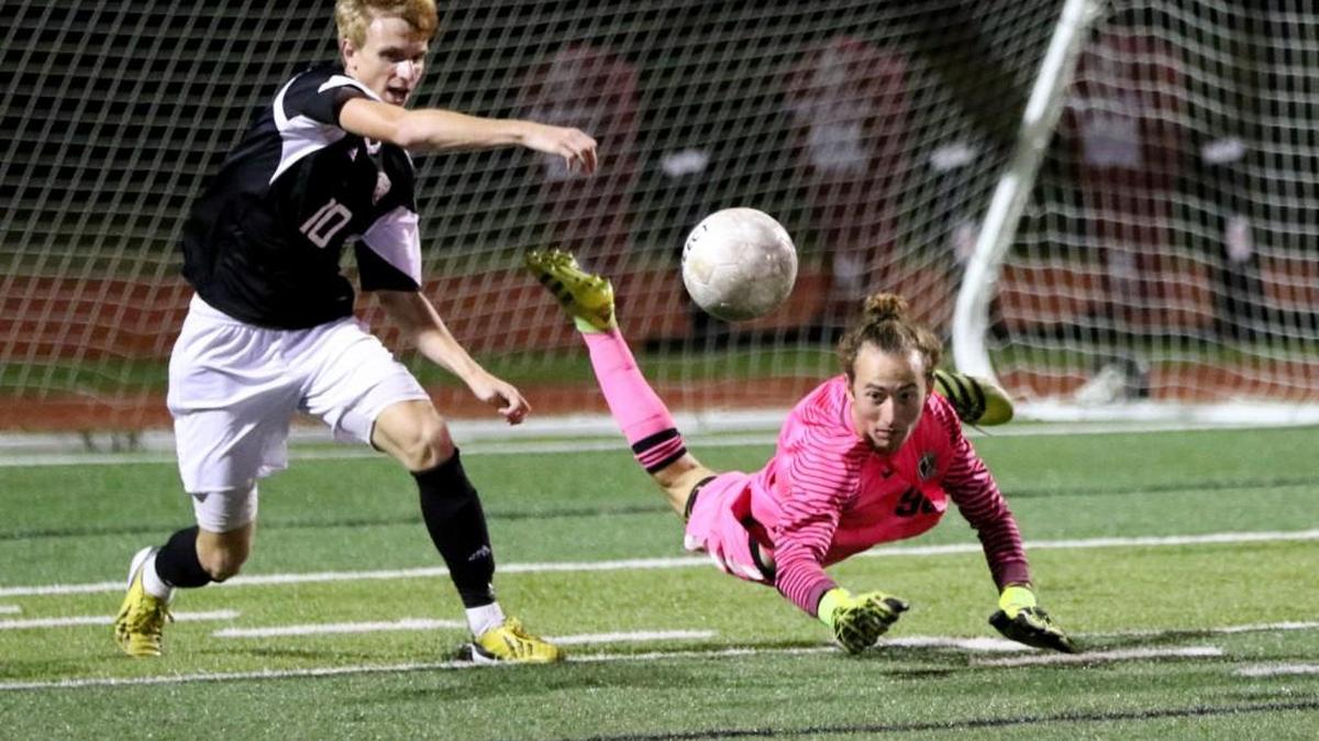 Colin Dooley (right) returns for a third season as the starting goalkeeper for Lee’s Summit North. Dooley had eight shutouts for the Broncos last season.
