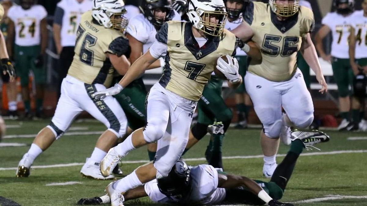 Lee’s Summit running back Preston Whitworth makes his way to the end zone for one of his two touchdowns against Columbia Rock Bridge Friday night. Whitworth rushed for 134 yards as Lee’s Summit won its first game of the season 27-21.