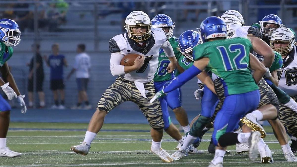 Lee’s Summit quarterback Preston Whitworth finds some running room during the visiting Tigers’ 49-21 loss Sept. 29, 2017, against Blue Springs South. Whitworth, who normally starts at running back, replaced injured starting quarterback Darrias Pearsall.