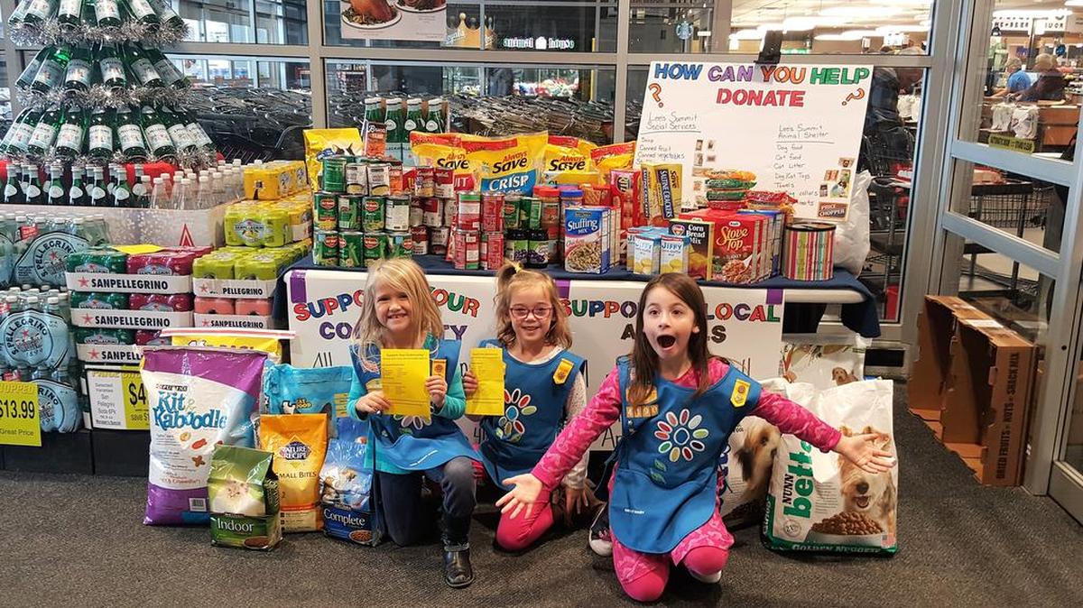 Members of Girls Scouts Daisy Troop 4190 recently collected and delivered canned and boxed goods along with other food items to benefit the pantry at Lee’s Summit Social Services in time for the holidays. Local Cub Scouts also participated in the charity endeavor.