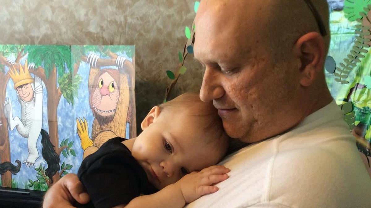 Cory Bair holds his great nephew, Asher. While Cory is doing well now, his mental illness motivated his parents to get involved with helping other families deal with understanding their loved one’s mental illness.