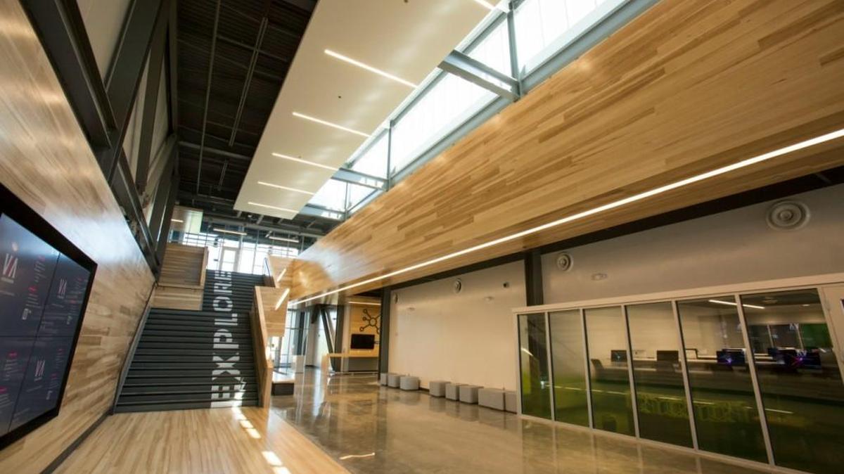 A word on a staircase describes the mission of the new Summit Technology Academy/Missouri Innovation Campus building.