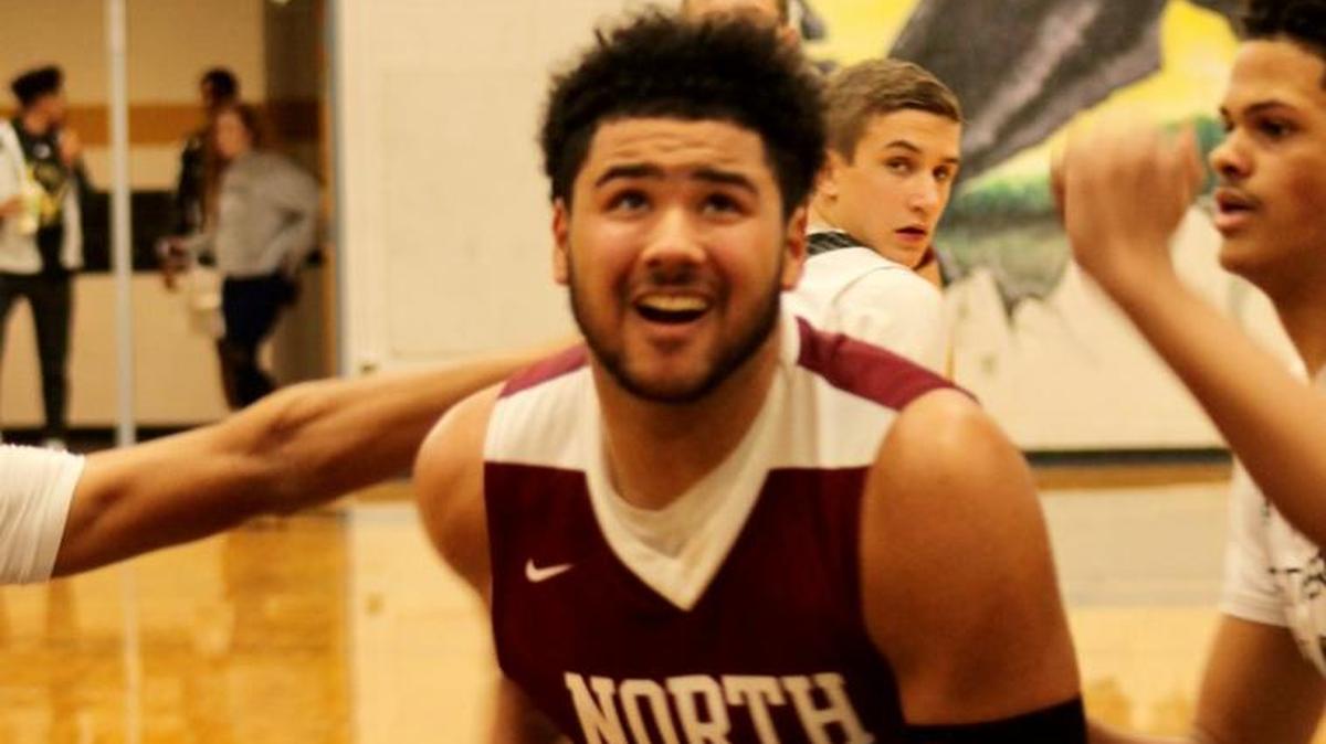 Lee’s Summit North’s Elijah Farr took the ball to the basket Tuesday, Dec. 19, 2017, at Ray-Pec. Farr, a senior, finished with 18 points in the Broncos’ 61-48 victory.