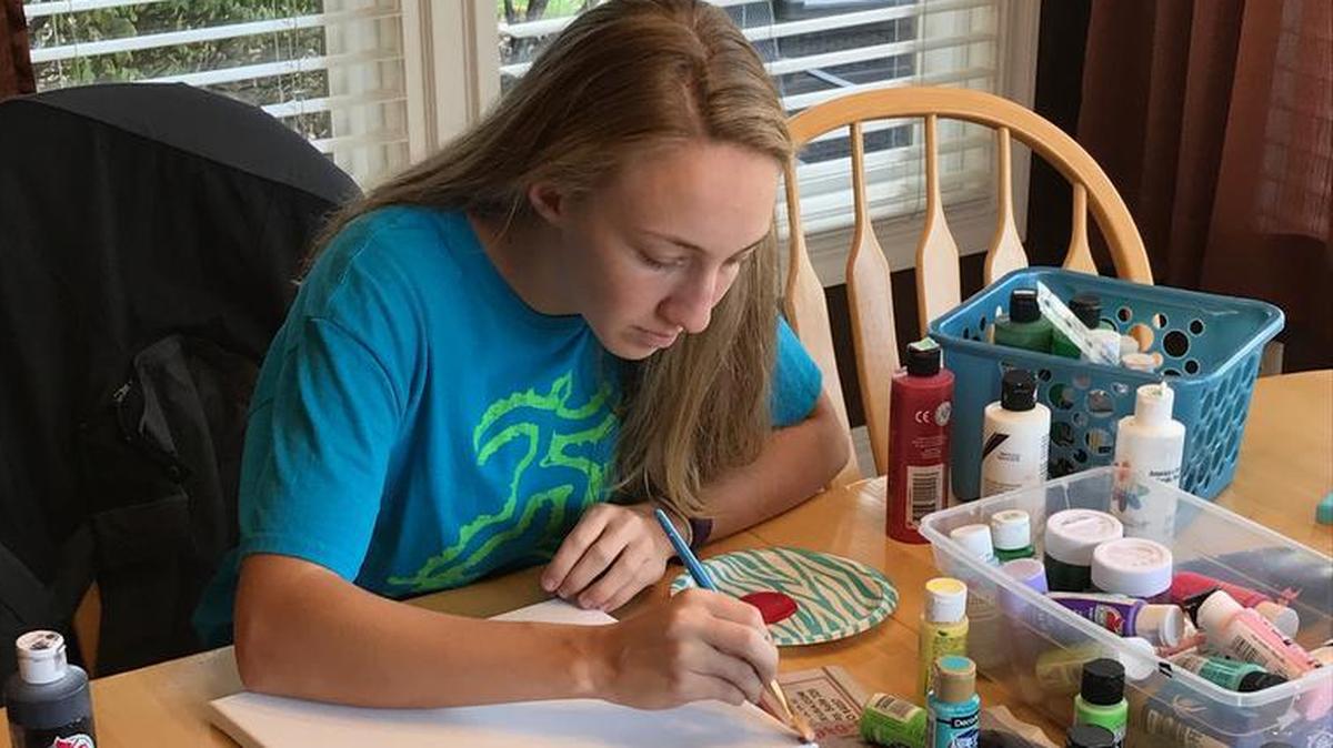 Morgan McGurk creating some of her art pieces.