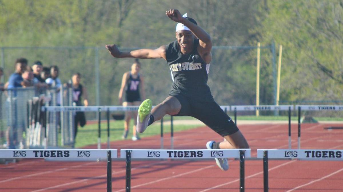 Lee’s Summit freshman Johnny Brackins competes in the 300-meter hurdles during the Darwin Rold Invitational track meet April 27 at Bud Hertzog Stadium. Brackins finished second in his first attempt at the race this season.