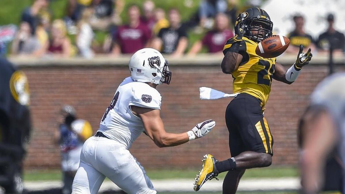 Missouri senior cornerback Logan Cheadle (right) intercepted a pass intended for Missouri State Bears wide receiver Jalen Esters (left) on Sept. 2 at Memorial Stadium in Columbia. Cheadle and the Tigers have won six straight games after a 1-5 start and will face Texas at 8 p.m. Dec. 27 in the Texas Bowl, the program’s first bowl since 2014.