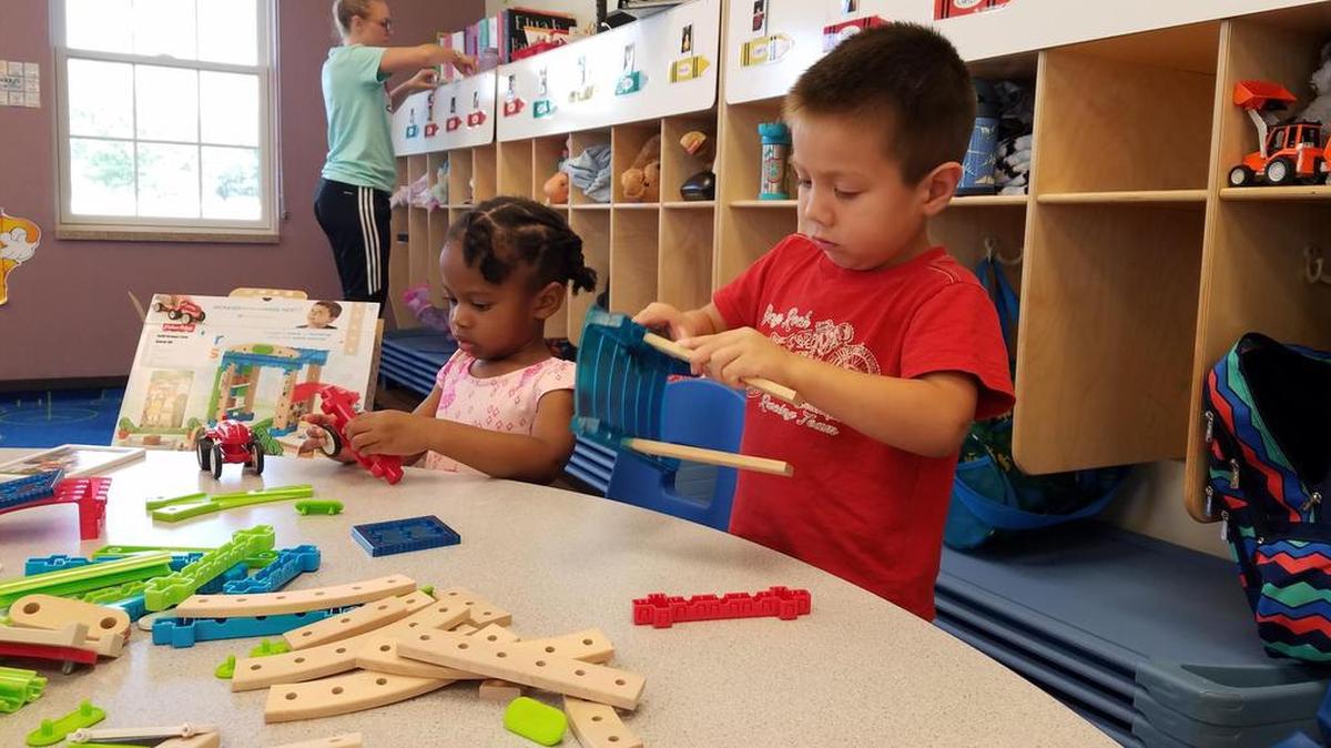 Trying out playthings was serious business for Goddard School students Keaton Loseke, 1, and 3-year-olds Hope Hatchett and Nolan Salinas.