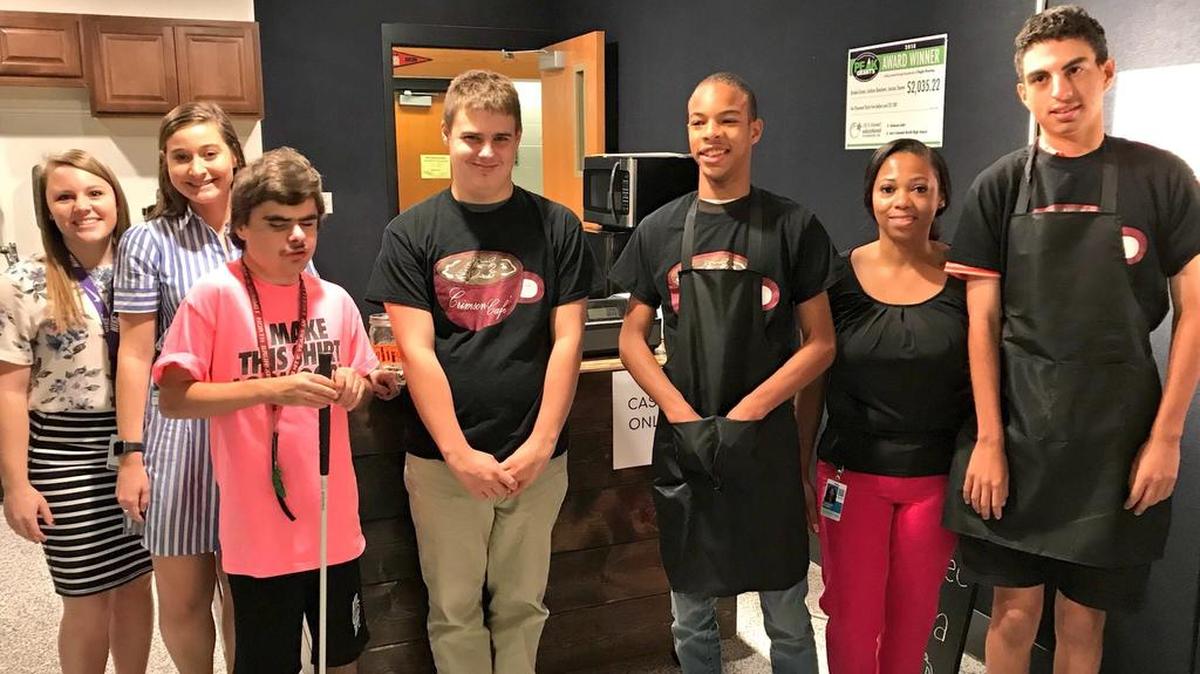 The Crimson Café and Gallery functions as a coffee shop, where Life Skills students get experience in a business-like milieu while serving to their fellow Broncos at Lee’s Summit North High School.
