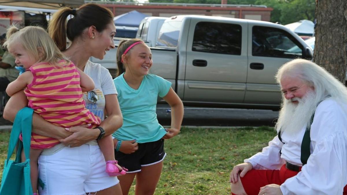 Nicki Mains, with her daughers Ava Salter, 10, and Berkley Mains, 2 , from Lenexa, came to check out the Farmers Market after it popped up online while she was searching for recipies.
