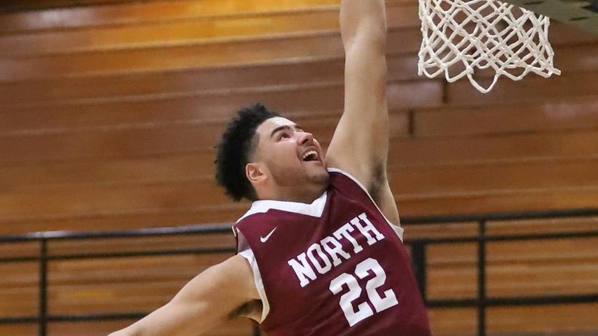 Lee’s Summit North senior Elijah Farr — shown here going up for a dunk during the Culver’s Classic earlier this month — scored 20 points Jan. 26 during the Broncos’ 80-74 victory at Lee’s Summit West.