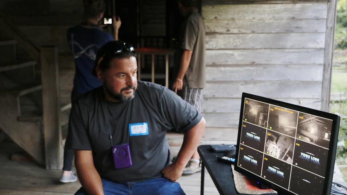 During Paranormal Investigation at Missouri Town 1855, Michael Jenesse, investigator with10th Dimension Paranormal Group, watched for spirit activity on a series of monitors setup at the site’s Tavern building. The event was held Sept. 15.
