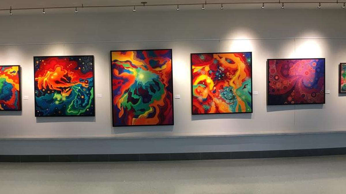 An exhibit of dynamic, nebula-inspired paintings by Catherine Kirkland, of Lenexa, has been on display at Lee’s Summit City Hall and will be available to view through mid-January. During the past year, Kirkland has also shown her abstract pointillist work at several venues, including the Lenexa City Hall, pictured, and the Johnson County Arts and Heritage Center.