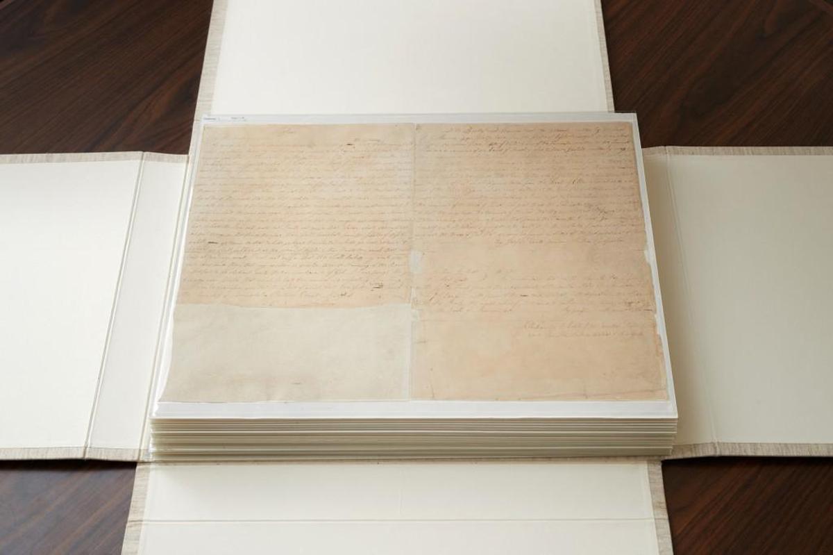 The first few pages of the printer’s manuscript of the Book of Mormon. It was kept in a vault in Independence until it was sold to the Church of Latter-day Saints.