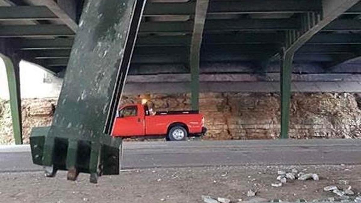A steel bridge support was damaged in a fatal car crash early Sunday morning. The left lane of eastbound Johnson Drive over Interstate 435 will be closed until further notice.