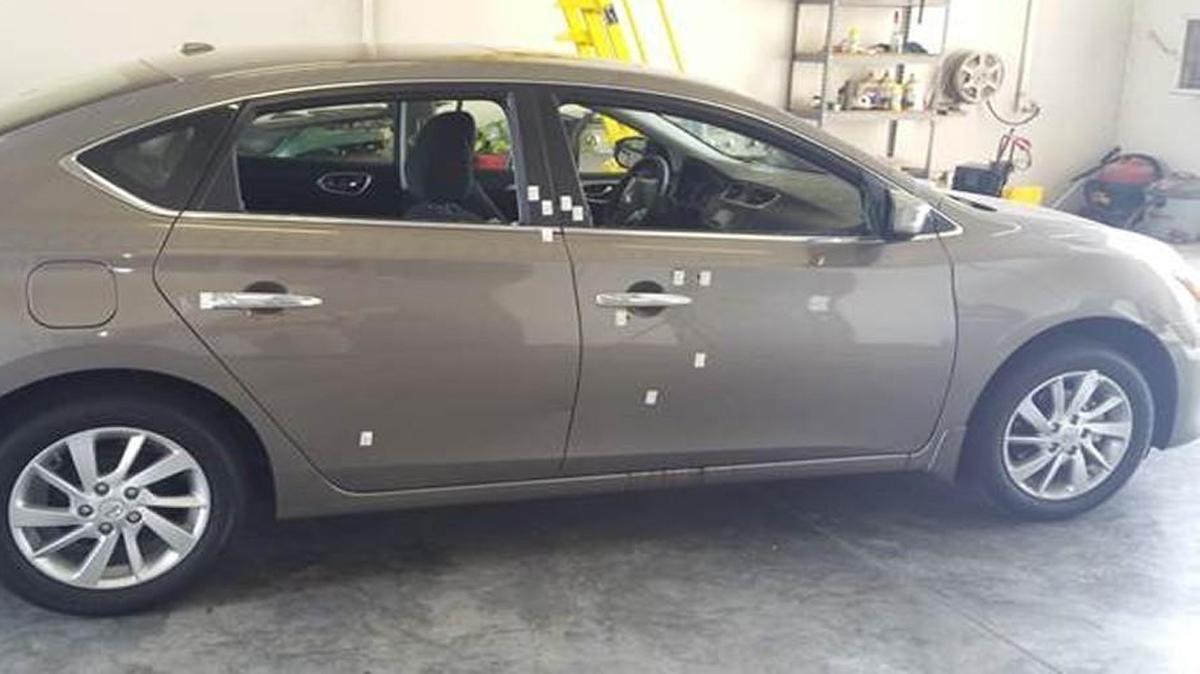
This car was struck by at least 13 bullets as it carried a Raymore family home from a Labor Day weekend gathering.
