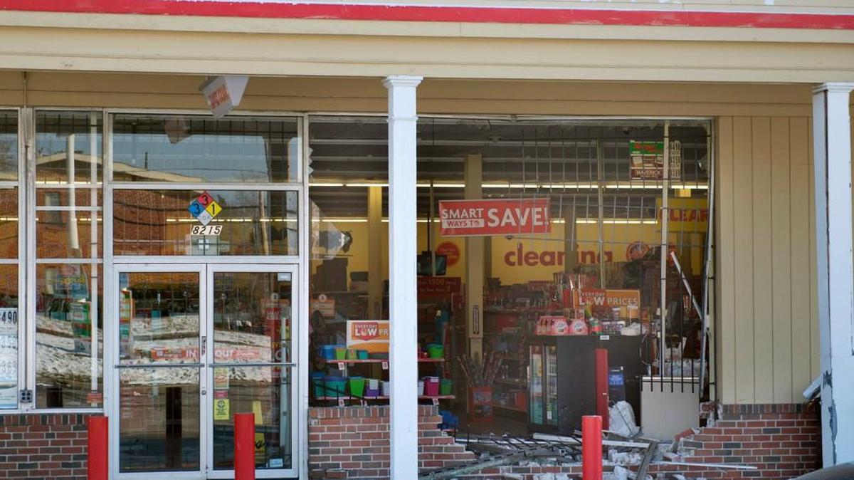 A vehicle went through the front of the Family Dollar store at 82nd Terrace and Troost Avenue in Kansas City, causing damage to the building in a burglary early Thursday morning.