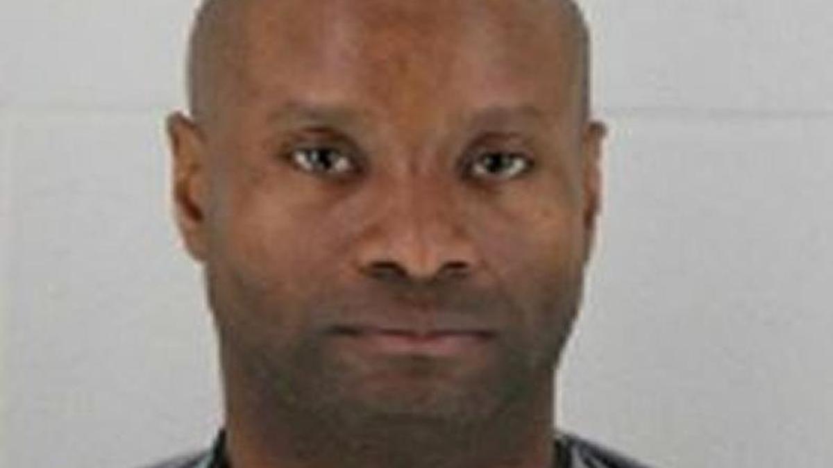 Michael Collins Smith reportedly turned himself in to police Friday and was charged in Johnson County District Court with first-degree murder in the killing of Anthony L. Shuster on Thursday in an apartment complex in the 7500 block of West 106th Street.