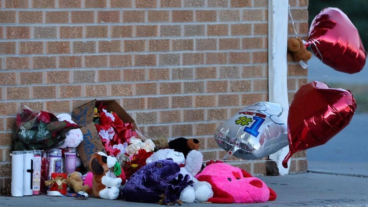 Family and friends of a teen who was fatally shot Friday inside a Kansas City, Kan., laundromat built a memorial Sunday in front of the building.