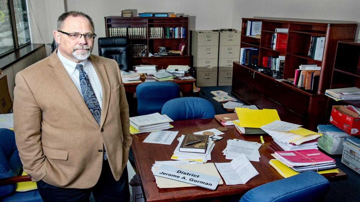 Outgoing Wyandotte County District Attorney Jerry Gorman stood in his partially packed-up office Thursday at the Wyandotte County Courthouse in Kansas City, Kan. Gorman, who lost his re-election bid to fellow Democrat Mark Dupree, who takes over Monday, is ending a 35-year career in the office.