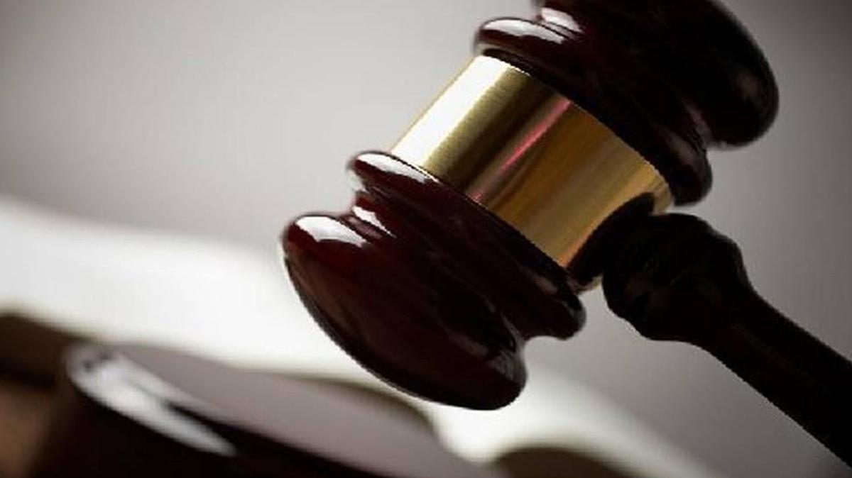 An Olathe man was sentenced Monday to a year and a day in federal prison for stealing more than $275,000 in merchandise while working at a sporting goods store catering to runners.