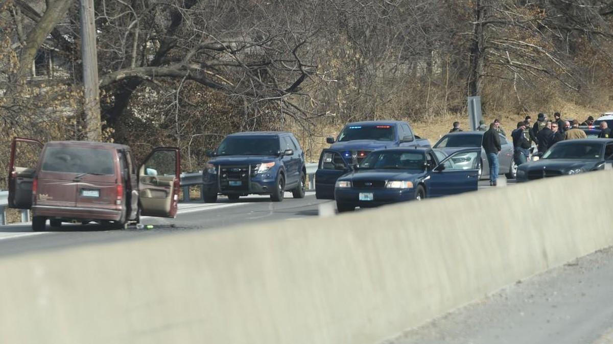 A van crashed after a police chase on I-35.
