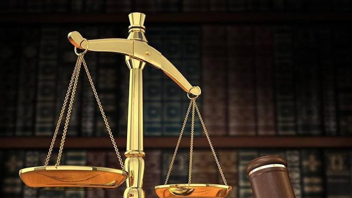 The former owner of a Kansas City, Kan., trucking company will spend nearly three years in federal prison for evading federal income taxes.