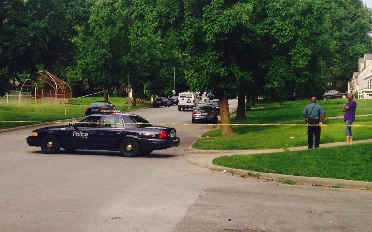 
Police investigated the scene after an officer shot a sword-wielding man Thursday at Blenheim Park in Kansas City. 
