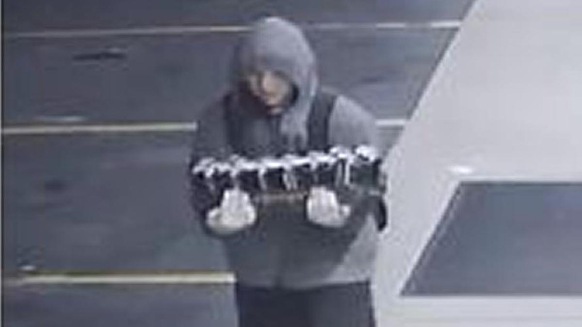 Police want to question this man, suspected of burglarizing a convenience store in Shawnee.