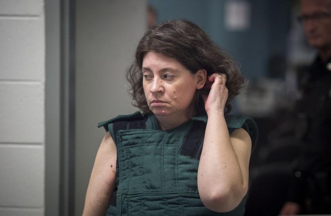 Therese Roever, who is charged with trying to kill her three children, walked into the video conference room as she made her first appearance from the Olathe Central Booking Facility, 101 N. Kansas Ave., on Wednesday, February 21, 2018, in Olathe, Kansas.