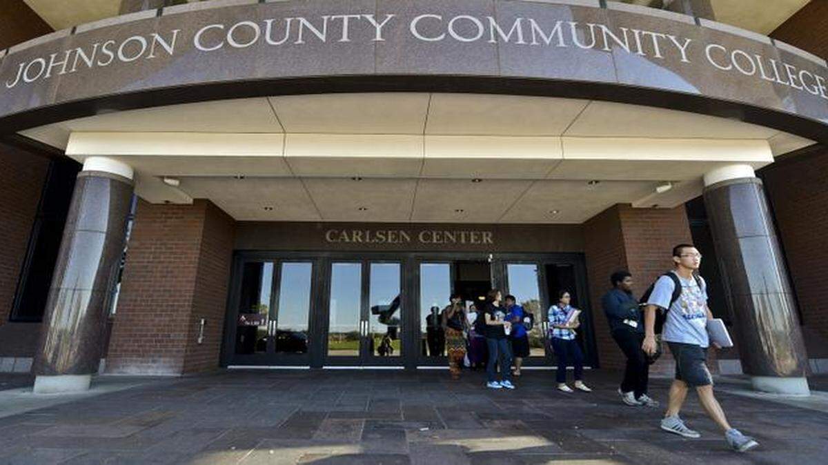 
People leave the Carlsen Center on Thursday at Johnson County Community College. The school was under a lockdown after a report of a female on campus with a gun.
