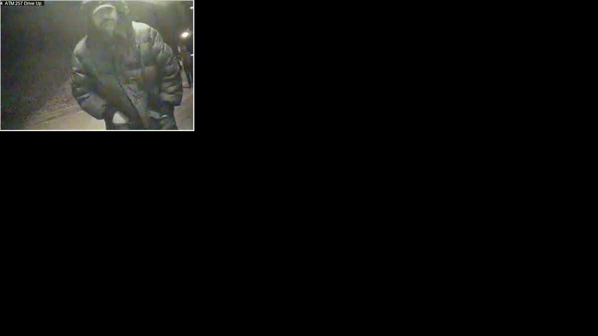 
Police released this photo of a man suspected of putting a credit card skimming device on a local bank ATM. 
