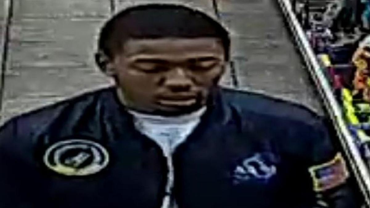 Police are seeking help in locating the person of interest connected to a Monday afternoon shooting death at a gas station.
