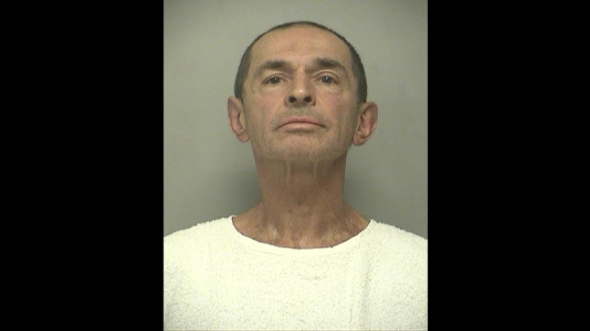 Robert J. Gross appears in a Kansas City Police Department booking photo. He went to trial Monday on interstate stalking and firearms charges.