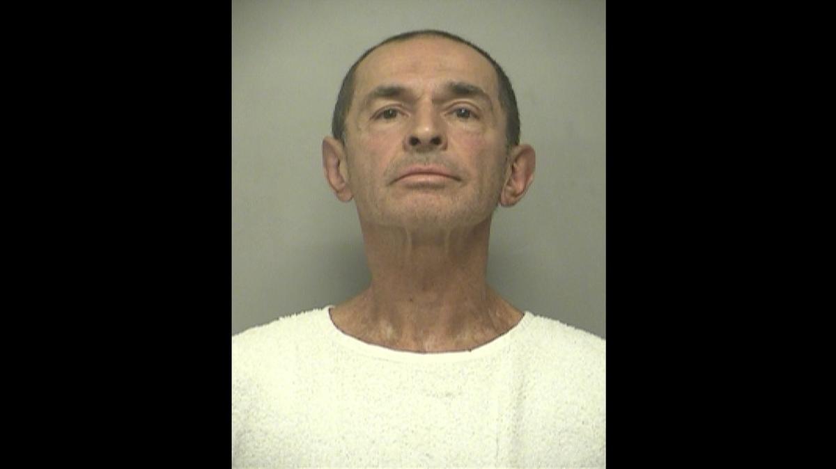 Robert J. Gross appears in a Kansas City Police Department booking photo. He went to trial Monday on interstate stalking and firearms charges.