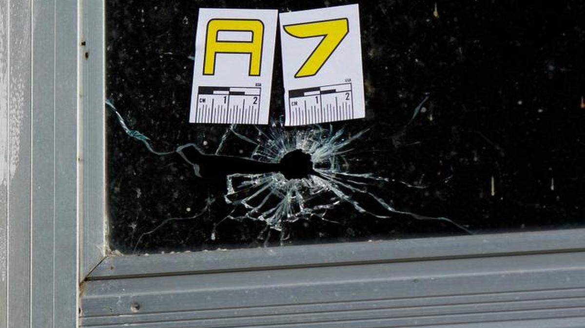 
Bullet holes marked by crime scene investigators were evident Monday, October 27, 2014, on a home on the corner of 15th Street and New Jersey Avenue in Kansas City, Kan., where 10-year-old Machole J. Stewart died when someone fired several bullets into the house Sunday night.
