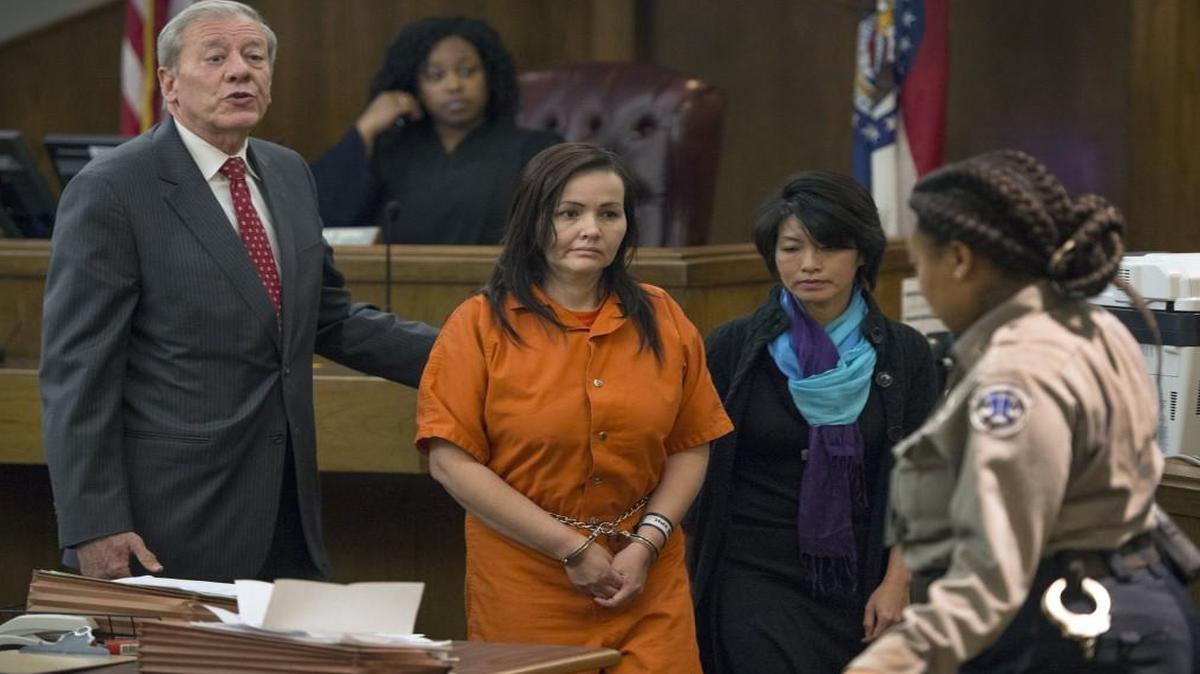 A bond reduction was denied for Thu Hong Nguyen on Dec. 11 before Jackson County Associate Circuit Judge Jalilah Otto. She was represented by defense attorney William Shull (left). Nguyen is charged in connection with the Independence Boulevard fire that killed two firefighters Oct. 12.