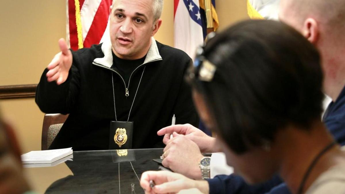 Joe McHale of the Kansas City Police Department led a 2013 meeting of the Kansas City No Violence Alliance.